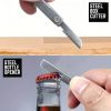 "Pocket-Sized Survival Tool â€“ Folding Knife, Bottle Opener, Hiking Clip & Phone Stand"